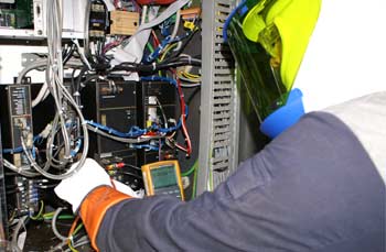 onsite engineer repairing a switch board
